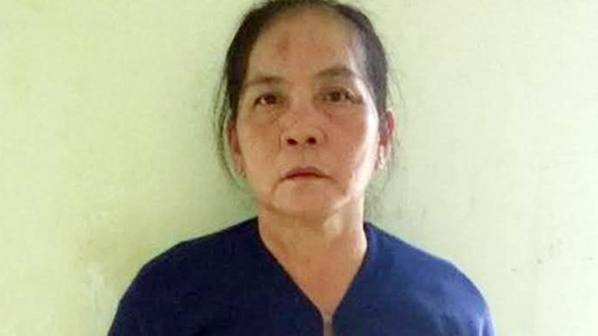 Bà già 61 tuổi bịt mặt, mang dao đi cướp ở Sài Gòn Bà Đèo tại cơ quan điều tra. Ảnh: Q.T