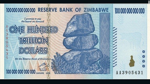 Đồng 100.000 tỷ đôla vô giá trị nhất thế giới Tờ 100.000 tỷ đôla Zimbabwe. Ảnh: CNN