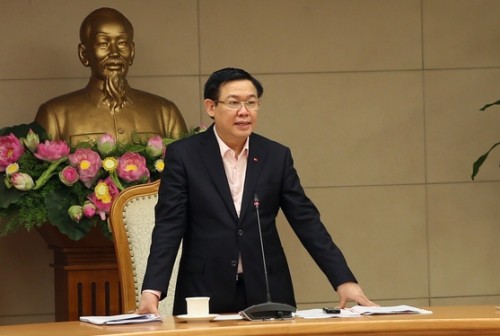 Phó Thủ tướng yêu cầu làm rõ việc chứng khoán biến động mạnh Phó Thủ tướng Vương Đình Huệ chủ trì cuộc họp nghe báo cáo triển vọng kinh tế vĩ mô 2018. Ảnh: VGP.