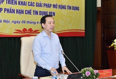 Đẩy lùi tín dụng đen cần sự vào cuộc đồng bộ của các tổ chức chính trị - xã hội Phó Thống đốc Đào Minh Tú phát biểu tại Hội nghị