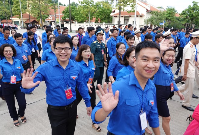 Các đảng viên trẻ tiêu biểu tham dự chương trình tổng kết đợt hoạt động cao điểm "Tuổi trẻ Việt Nam nhớ lời Di chúc theo chân Bác" Ảnh: Như Ý