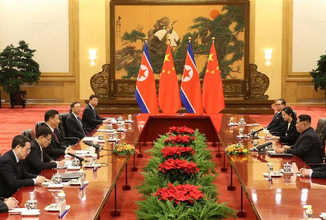 Hội đàm với Chủ tịch Tập, Chủ tịch Kim nói 'sẵn sàng từ bỏ hạt nhân' Ảnh: Tân hoa xã