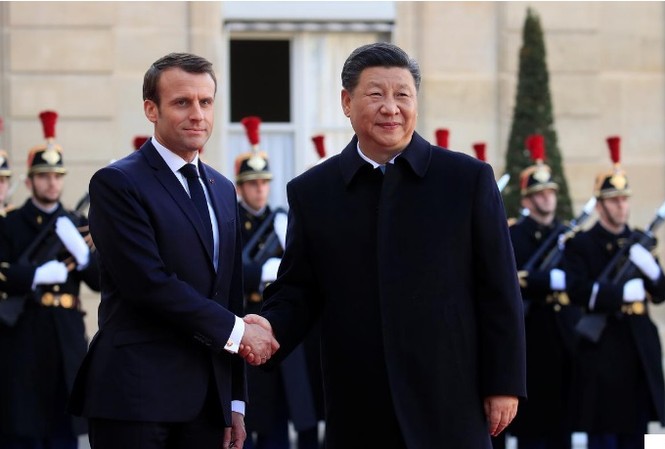 Pháp-Trung Quốc ký các hợp đồng thương mại trị giá hàng tỉ euro Tổng thống Pháp Emmanuel Macron đón tiếp Chủ tịch Trung Quốc Tập Cận Bình thăm Pháp ngày 25/3.