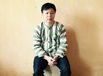 Hai cô gái mưu trí thoát 'động quỷ' nhờ tiếng mẹ đẻ Đối tượng Trương Văn Long tại cơ quan công an. Ảnh: Xuân Ân