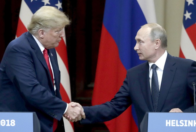 Hiệp ước INF ‘phủ bóng’ cuộc gặp tháng 11 của ông Trump – Putin Tổng thống Nga Putin (phải) và Tổng thống Mỹ Trump (trái). Ảnh: Tass