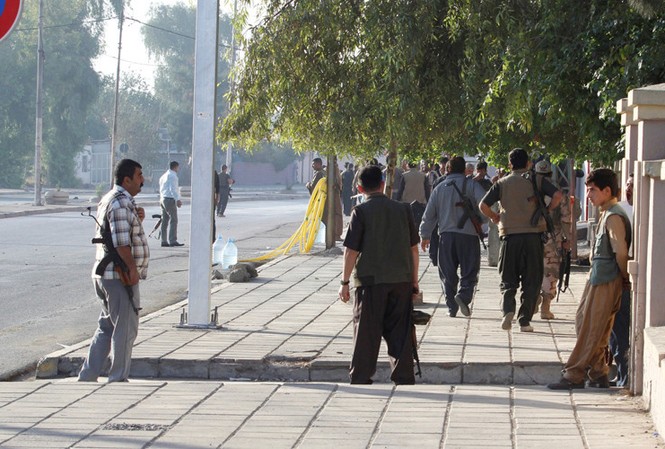 IS tấn công nhà thờ, bắt cóc dân thường làm con tin Lực lượng an ninh tại Kirkuk, Iraq.