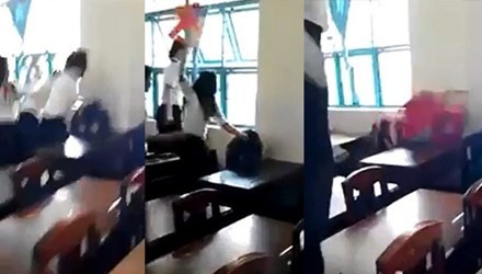 Vụ nữ sinh bị đánh hội đồng: Chưa công bố quyết định kỷ luật! Nữ sinh lớp 7/5 bị đánh hội đồng. Ảnh cắt ra từ clip.