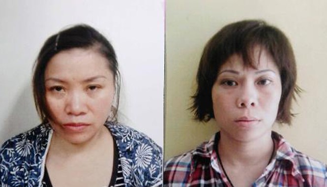 Tin mới về vụ mua bán trẻ ở chùa Bồ Đề Đối tượng Phạm Thị Nguyệt (trái) và Nguyễn Thị Thanh Trang tại cơ quan công an. Ảnh: Cơ quan công an cung cấp.