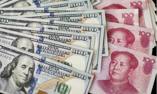 Nhân dân tệ có thể phá giá mạnh hơn nữa NDT được dự báo mất giá gần 3% so với USD trong 6 tháng cuối năm. Ảnh: Bloomberg.