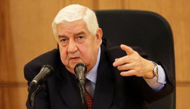 Radio Thế giới 24h: Syria phản đối nỗ lực liên bang hóa Ngoại trưởng Syria Walid Muallem phát biểu họp báo ở thủ đô Damascus hôm 12/3. Ảnh: AFP/TTXVN.