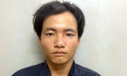 Đặc nhiệm đá văng tên cướp ở trung tâm Sài Gòn Thái tại cơ quan điều tra. Ảnh: Quốc Thắng.