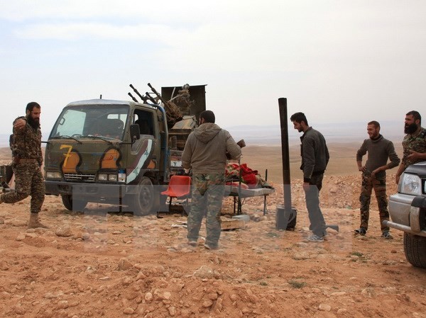 Bản tin 20H: Syria bắt đầu sử dụng vũ khí Nga cung cấp Binh sỹ Syria tại làng Jihar sau chiến dịch truy quét ngày 8/3. Nguồn: AFP/TTXVN