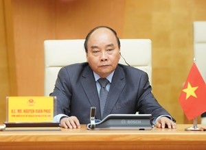 Thủ tướng Nguyễn Xuân Phúc chia sẻ với G20 về các biện pháp đối phó COVID-19 Thủ tướng Nguyễn Xuân Phúc dự Thượng đỉnh G20 trực tuyến. (Ảnh: VGP)