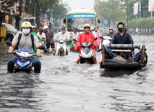 Sài Gòn có nguy cơ ngập ngày Tết Đỉnh triều lên cao vào hai ngày đầu năm Bính Thân. Ảnh minh họa: Hữu Nguyên.