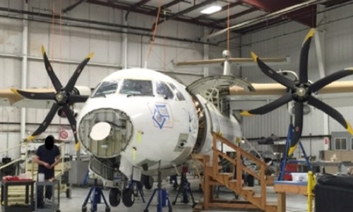 Mỹ tốn hơn 80 triệu USD vào phi cơ chưa một lần sử dụng Phi cơ ATR 42-500 trong nhà chứa ở bang Delaware, Mỹ. Ảnh: US Department of Justice.