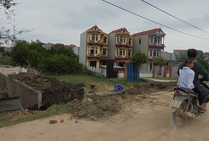 Hà Nội 'chốt' thời hạn xử lý xong vi phạm đất đai tại Sóc Sơn Các công trình xây dựng trên đất nông nghiệp tại thôn Thu Thủy, xã Xuân Thu, Sóc Sơn. Ảnh: Nguyễn Thắng