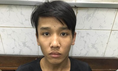 Tên trộm bị đạp văng vào lề đường Đối tượng Nguyễn Tuấn Hoàng tại cơ quan điều tra. Ảnh: Q.T