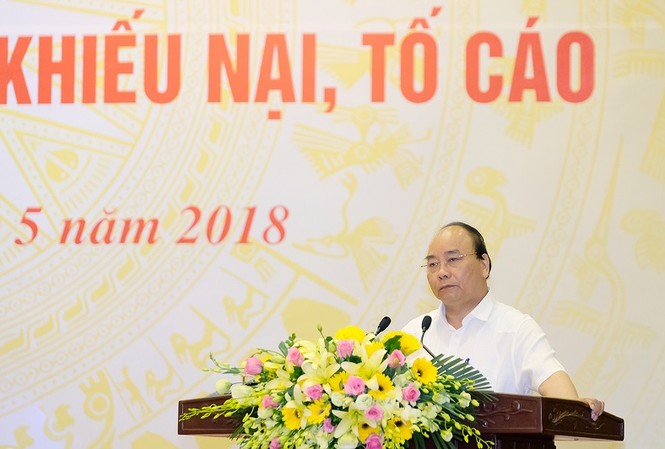 Thủ tướng: 'Không được coi thường những đốm lửa nhỏ' Thủ tướng Nguyễn Xuân Phúc chủ trì Hội nghị về giải quyết khiếu nại, tố cao (ảnh N.H)