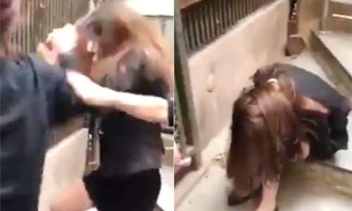 Công an điều tra clip đánh ghen, ép thiếu nữ van lạy giữa đường Hình ảnh cô gái bị nắm tóc, đấm đá vào mặt. Ảnh: Cắt từ video