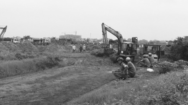 Đảm bảo quyền lợi người bị thu hồi đất Quận Hà Đông (Hà Nội) tổ chức cưỡng chế GPMB dự án đất dịch vụ phường Dương Nội sáng 22/4. Ảnh: Đức San