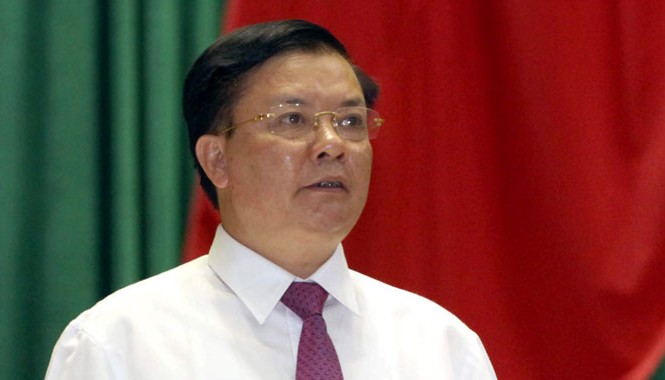 Nợ công đe dọa an ninh tài chính vĩ mô Bộ trưởng tài chính Đinh Tiến Dũng trả lời chất vấn. Ảnh: Hồng Vĩnh