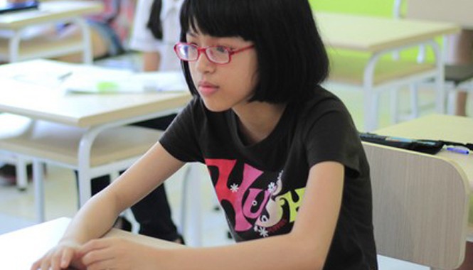 62 trường “đọ tài” tại cuộc thi English Champion 2014 Em Bùi Minh Hiền trong phòng thi