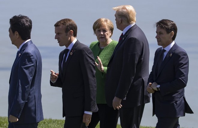 Bất đồng thuế thép: Ông Trump giảm tông tại G7 Các lãnh đạo G7 trước khi bước vào hội đàm chính thức hôm 8/6. Ảnh: AFP.