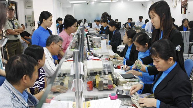 Tỷ giá ổn định có lợi cho phát triển kinh tế Giá USD đã giảm 0,24% thấp hơn đáng kể so với biên độ biến động 2-3% của những năm trước.
