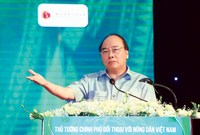 Giải bài toán vốn, giá, thị trường... Thủ tướng Nguyễn Xuân Phúc đối thoại với nông dân Việt Nam. Ảnh: TTXVN.