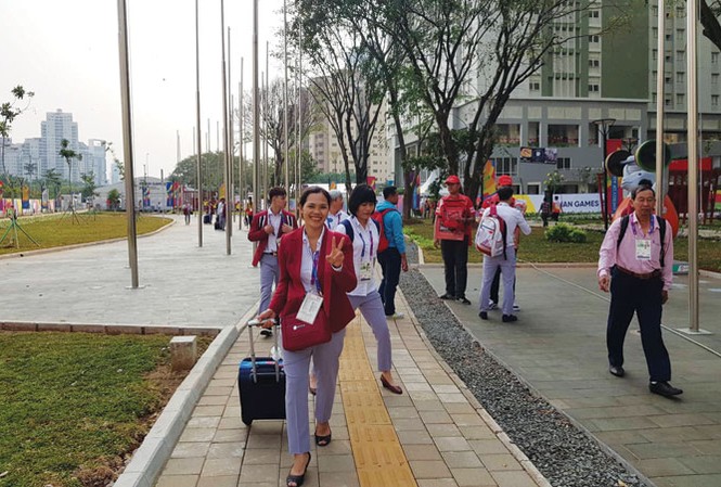 Chủ động vượt khó ở Asiad 2018 Các VÐV đoàn TTVN nhập làng VÐV Asiad 2018. Ảnh: T.SÂM.