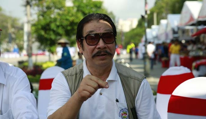Việt dã Tiền Phong là di sản quý của thể thao VN Nguyên Trưởng đoàn TTVN tại các kỳ SEA Games Nguyễn Hồng Minh trao đổi bên lề lễ khai mạc Việt dã toàn quốc và marathon giải báo Tiền Phong lần thứ 57 năm 2016. Ảnh: Hồng Vĩnh