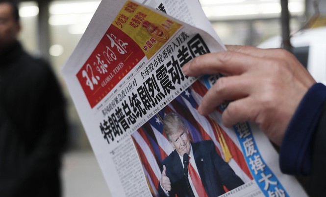 Bắc Kinh bắt đầu trả đũa ông Trump? Quan hệ Mỹ - Trung được dự đoán sẽ sóng gió trong năm 2017. Ảnh: Business News