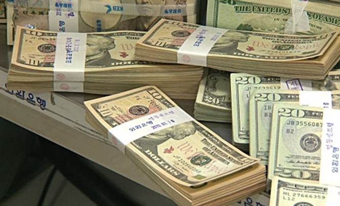 Tỷ giá 2017 dự báo tăng 2-3% USD sẽ lên ngưỡng trên 23.200 USD/ vào cuối năm nay.
