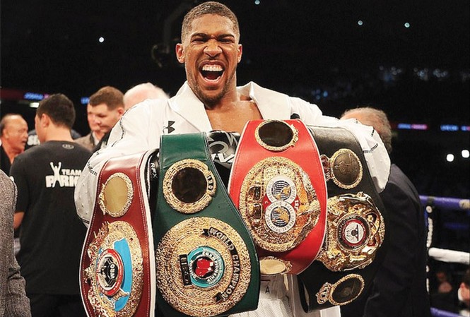 Vua quyền Anh Joshua xưng bá võ đài Joshua thống nhất 4 đai vô địch hạng nặng WBA, IBF, IBO, WBO.