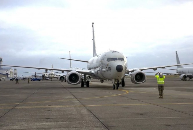 Mỹ - Trung lại đụng độ ở Thái Bình Dương Máy bay tuần thám biển P-8A Poseidon của hải quân Mỹ ảnh: AP