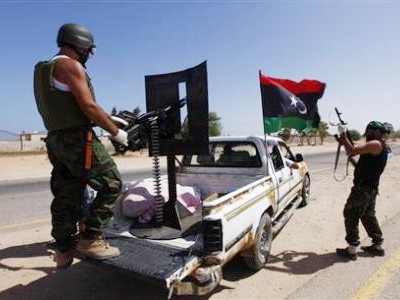 Quân nổi dậy tiến đánh quê hương ông Gaddafi Quân nổi dậy tiến đánh quê hương ông Gaddafi
