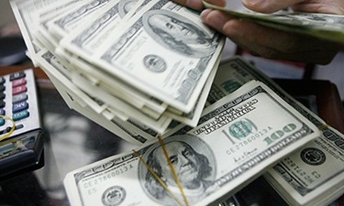 Đằng sau hàng tỷ USD ngân hàng gửi ra nước ngoài Quan điểm cho rằng ngân hàng gặp "bẫy thanh khoản" ngoại tệ tiếp nhận nhiều phản biện quyết liệt từ phía nhà băng. Ảnh: NDO
