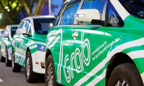 Grab: Quản như công ty taxi là bước lùi của Việt Nam Xe Grab, Uber có thể phải gắn phù hiệu Taxi.