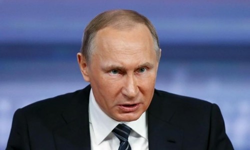Tổng thống Putin cứu mức tín nhiệm bằng căng thẳng với Ukraine? Tổng thống Nga Putin tại Moskva tháng 12/2015. Ảnh: Reuters.