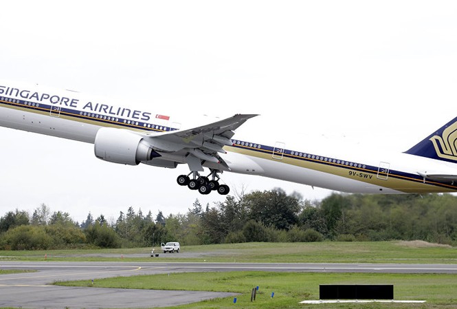 Cảnh báo giả đánh bom máy bay, một phụ nữ và trẻ em bị bắt giữ Một chiếc Boeing của Singapore Airlines. Ảnh:
AP