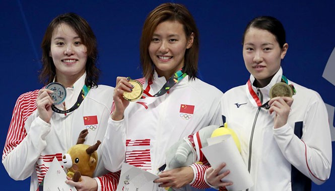 5 kỷ lục thế giới được thiết lập ở ASIAD 2018 Liu Xiang (giữa) thiết lập kỷ lục ở môn bơi