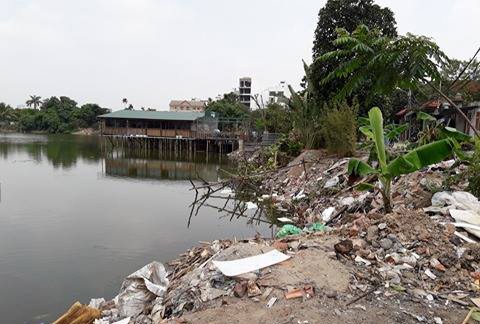 Ngang nhiên xây nhà trái phép trên hồ sen Đầm Trị Ngang nhiên xây nhà trái phép trên hồ sen Đầm Trị
