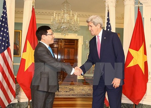 Tổng thống Mỹ Obama mong đến thăm Việt Nam Phó Thủ tướng, Bộ trưởng Ngoại giao Phạm Bình Minh và Ngoại trưởng Mỹ John Kerry tại cuộc hội đàm hôm qua. Ảnh: TTXVN