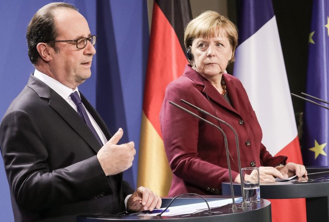 ‘Bộ tứ Normandy’ nhất trí lộ trình hòa bình ở miền đông Ukraine Tổng thống Pháp Francois Hollande cùng Thủ tướng Đức Angela Merkel trong cuộc họp báo chung ở Berlin.