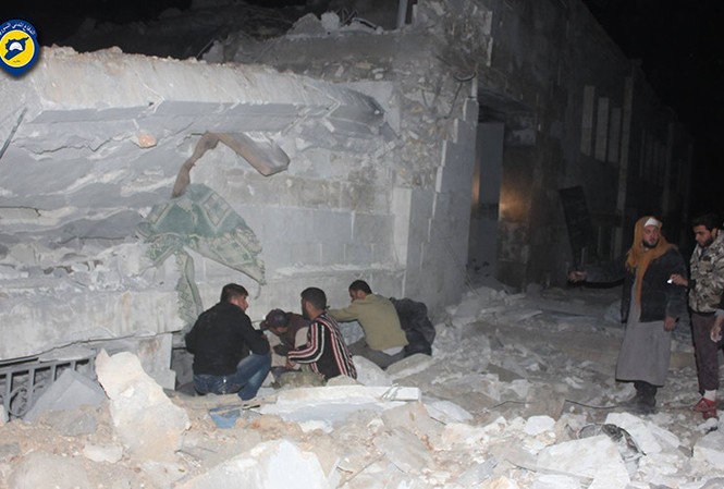 Nhà thờ Syria bị không kích, hơn 50 người thiệt mạng Hiện trường vụ không kích nhà thờ hôm 16/3 ở al-Jina, tây bắc Syria.