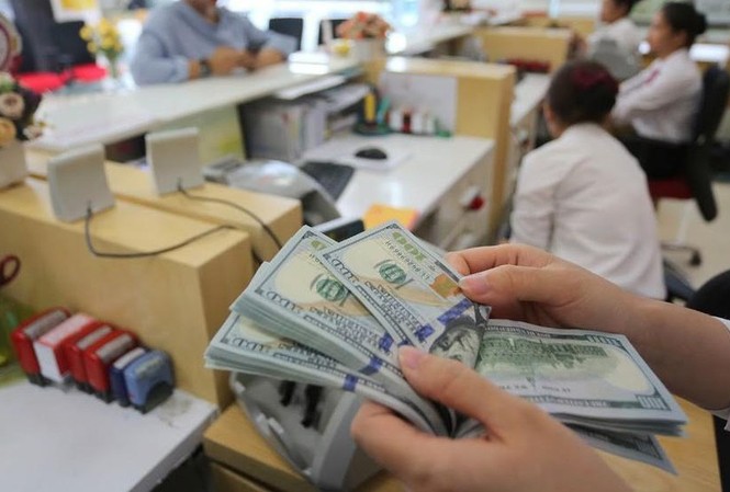 Vì sao Ngân hàng Nhà nước liên tiếp tăng giá USD? Chuyên gia kinh tế lý giải về nguyên nhân khiến tỷ giá trung tâm tăng cao. ảnh minh hoạ
