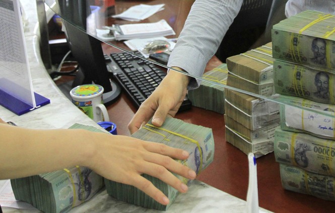 Trầy trật tăng tín dụng Không cho vay được, tín dụng ngân hàng tăng trưởng rất thấp. Ảnh: Như Ý