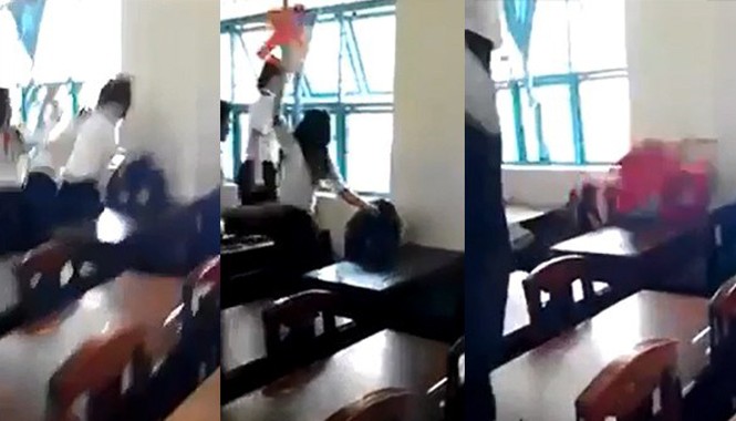 Nữ sinh tại Trà Vinh bị đánh hội đồng: Đuổi học có phải là biện pháp tốt? Nữ sinh lớp 7/5 bị đánh hội đồng. Ảnh cắt ra từ clip.