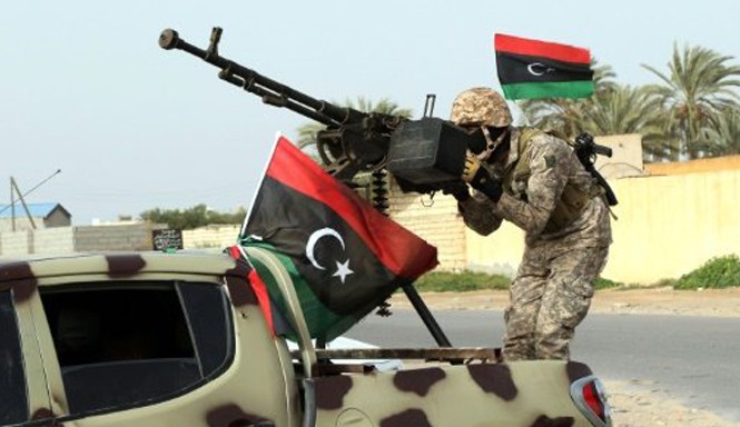 Các tay súng tấn công đài truyền hình ở Libya Libya rơi vào hỗn loạn với hai chính phủ tồn tại song song. Ảnh minh họa: AFP.