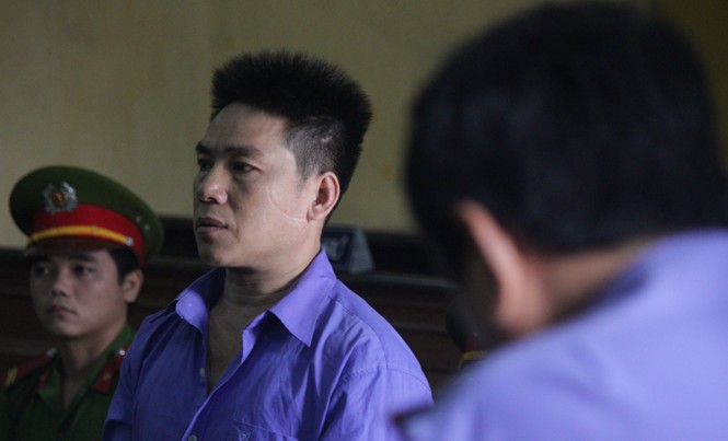 Án tử cho kẻ giết người phân xác rúng động Sài Gòn Bị cáo Đặng Thanh Tuấn tại toà. Ảnh: Tân Châu.